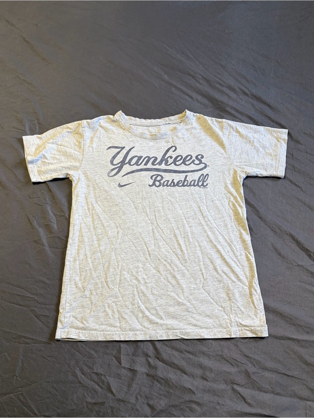 Grey Nike Yankees baseball tee w/navy blue 'Yankees Baseball' logo.Size M